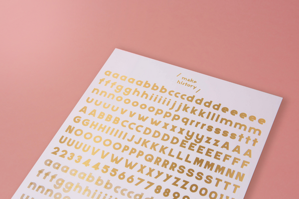 Gold foil rub on characters